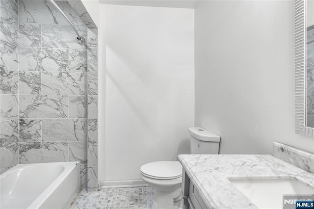 full bathroom featuring toilet, vanity, and washtub / shower combination