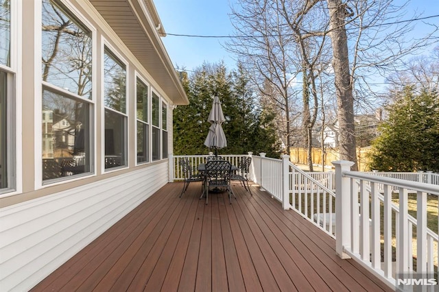 deck featuring outdoor dining space