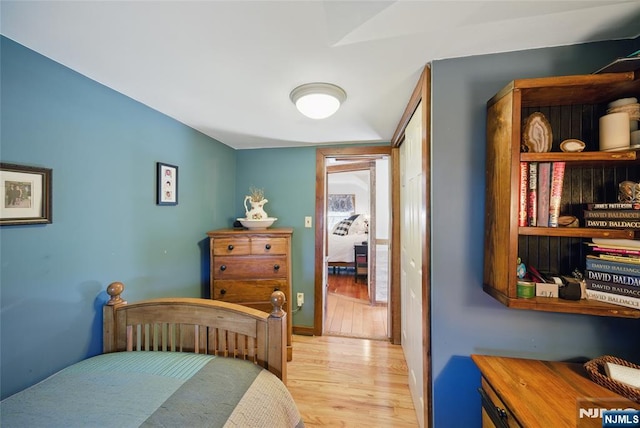 bedroom with light wood finished floors