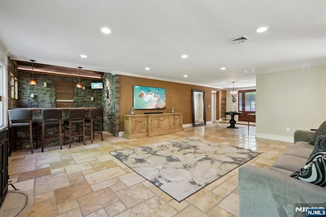 living area featuring crown molding, recessed lighting, and baseboards