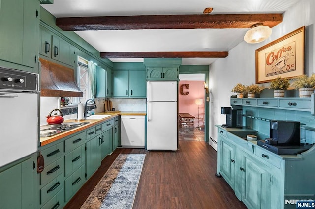 kitchen with dark wood-style flooring, white appliances, green cabinets, and a sink