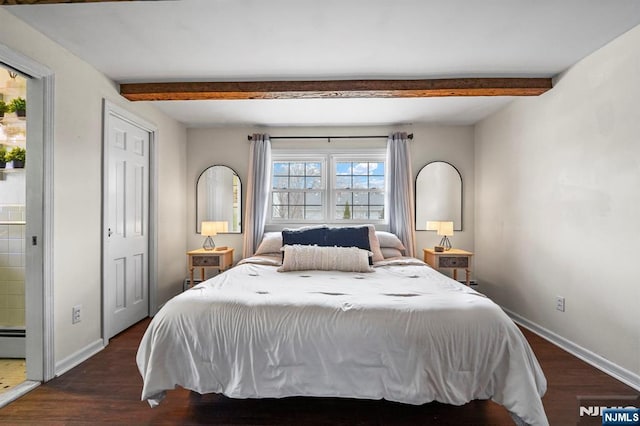 bedroom with baseboards, beam ceiling, and dark wood finished floors