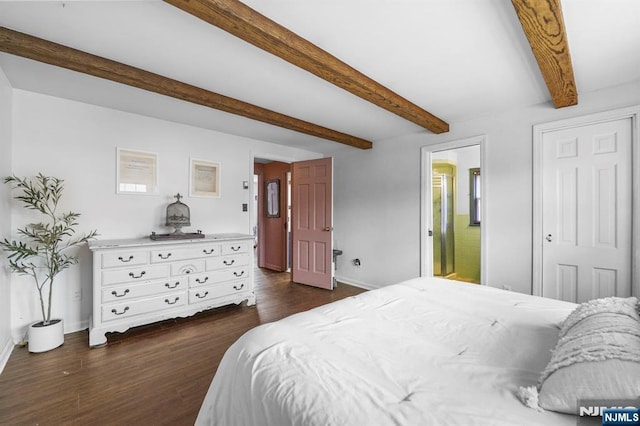 bedroom with beamed ceiling, baseboards, and dark wood finished floors