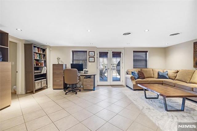 office space featuring light tile patterned flooring, visible vents, recessed lighting, and french doors