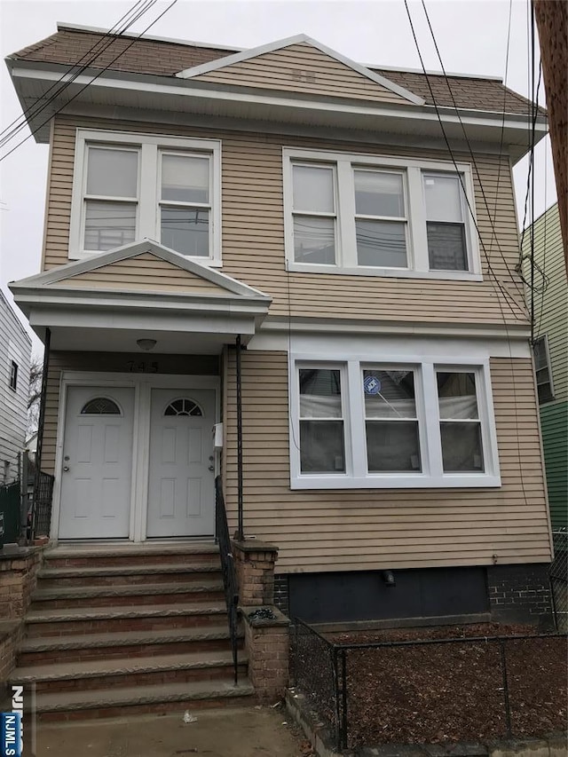 view of front of property featuring entry steps