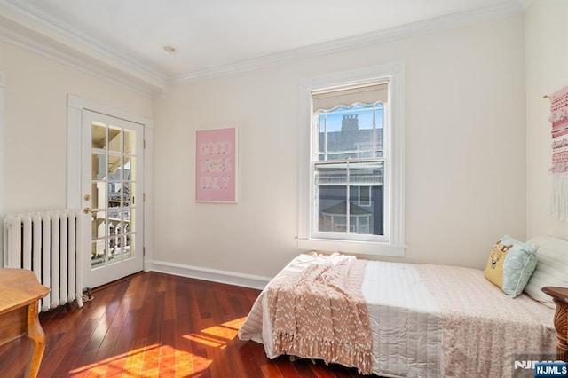 bedroom with ornamental molding, access to outside, wood finished floors, radiator, and baseboards