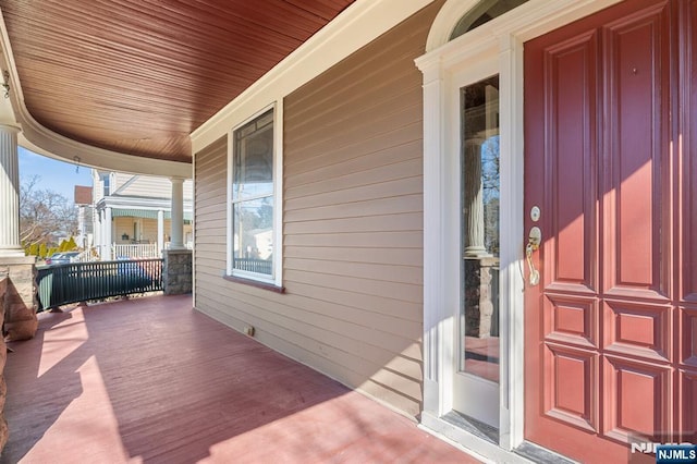 wooden deck with a porch