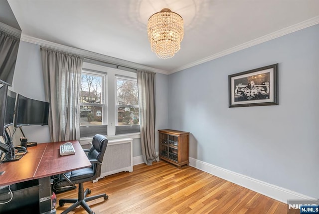 home office featuring radiator, light wood-style floors, and ornamental molding