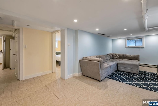 living room featuring light tile patterned flooring, recessed lighting, baseboards, and a baseboard radiator