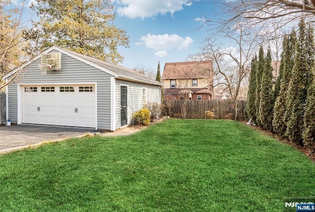 detached garage with fence