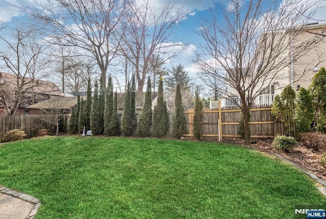 view of yard featuring fence