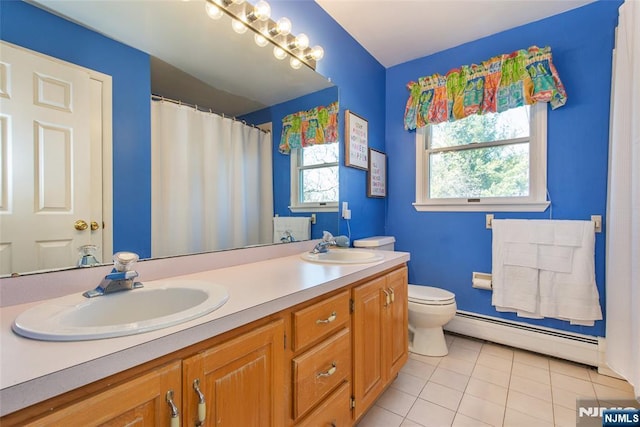 full bathroom featuring a sink, toilet, tile patterned flooring, and a baseboard radiator