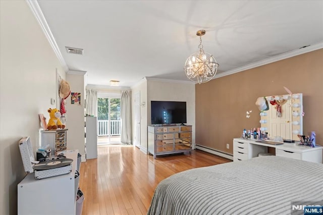 bedroom with visible vents, crown molding, a chandelier, light wood-style flooring, and a baseboard radiator