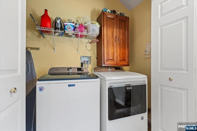 laundry room with cabinet space and independent washer and dryer