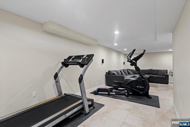 workout room with recessed lighting and baseboards