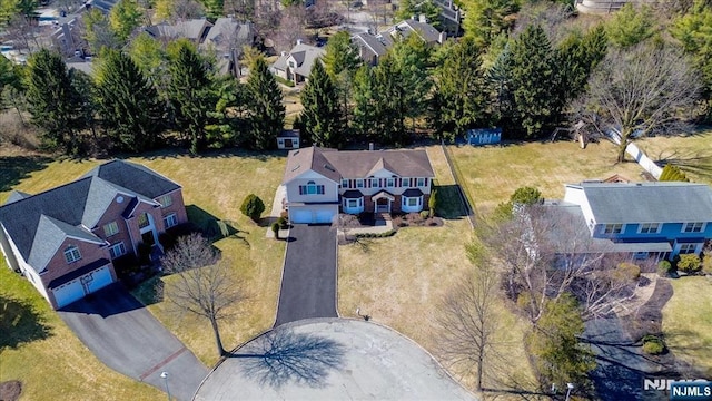 drone / aerial view with a residential view