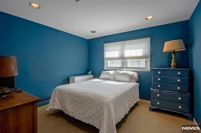 bedroom featuring carpet flooring, recessed lighting, and a baseboard radiator