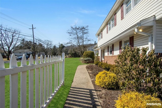 view of yard featuring fence