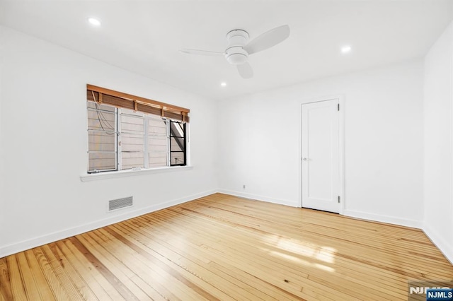 unfurnished room featuring visible vents, ceiling fan, baseboards, hardwood / wood-style floors, and recessed lighting