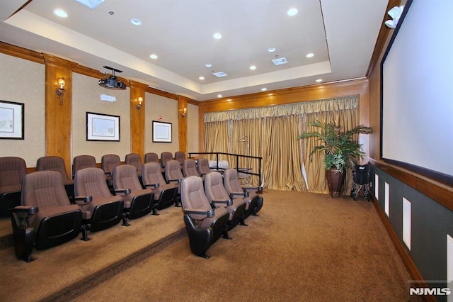 carpeted home theater with recessed lighting, a tray ceiling, and visible vents