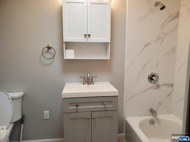 full bathroom featuring toilet, vanity, and shower / tub combination