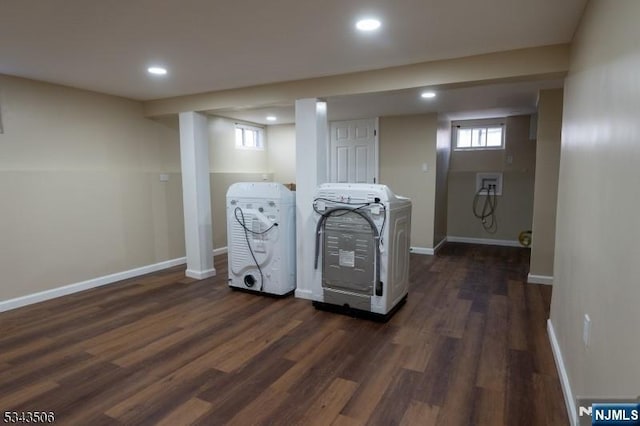 clothes washing area featuring recessed lighting, baseboards, washer / clothes dryer, and dark wood-type flooring