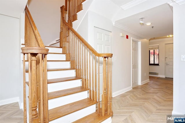 staircase featuring baseboards, baseboard heating, and crown molding