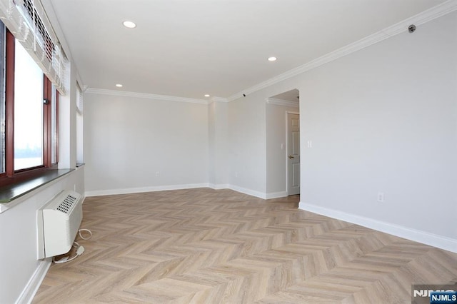 spare room featuring recessed lighting, baseboards, ornamental molding, and a wall mounted AC