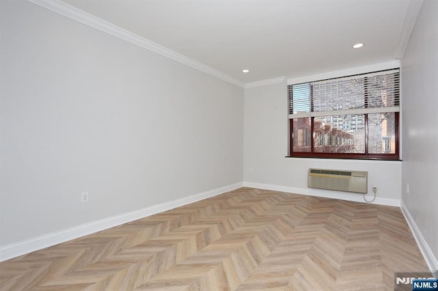 unfurnished room featuring recessed lighting, crown molding, a wall mounted AC, and baseboards