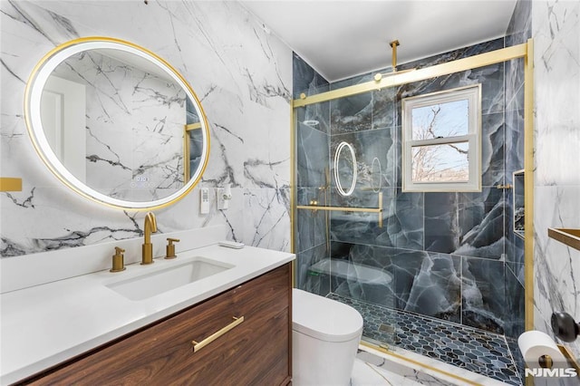 full bathroom featuring vanity, stone wall, a stall shower, toilet, and marble finish floor