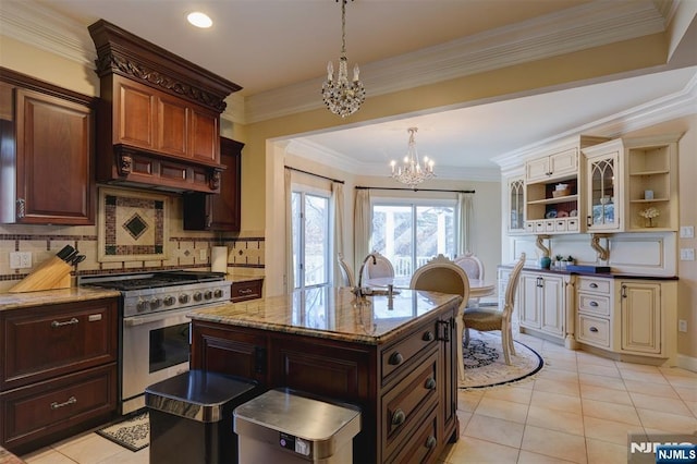 kitchen with open shelves, light tile patterned flooring, high end stainless steel range, backsplash, and a chandelier