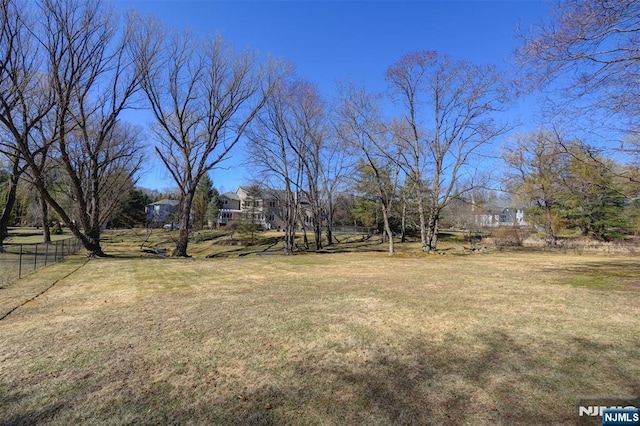 view of yard featuring fence