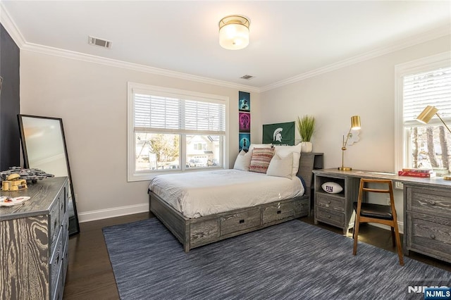 bedroom with visible vents, baseboards, ornamental molding, and dark wood-style flooring