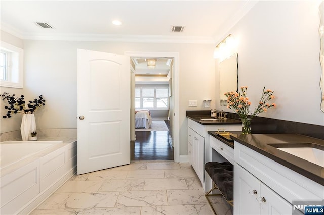 ensuite bathroom with visible vents, marble finish floor, and crown molding