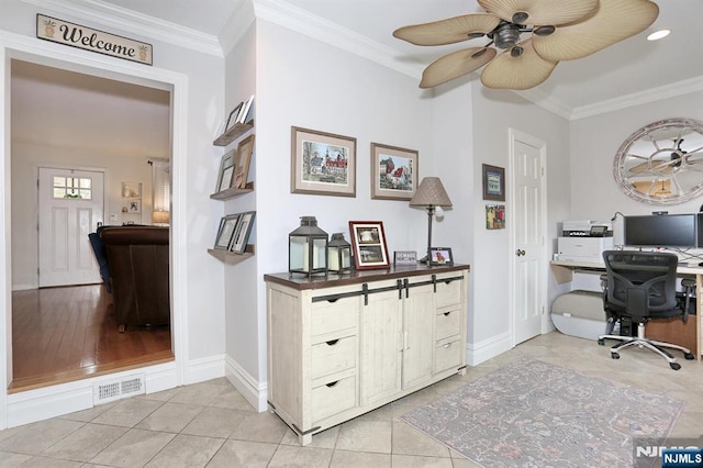 home office featuring crown molding, baseboards, and visible vents