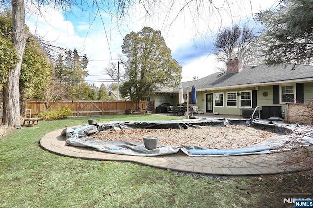 view of yard with a patio and fence