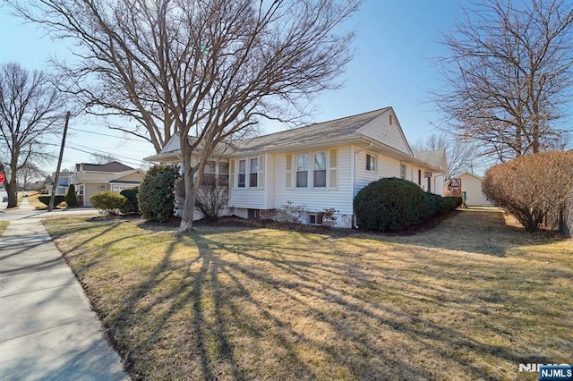 view of front of home with a front yard