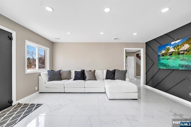 living room with recessed lighting, visible vents, baseboards, and marble finish floor