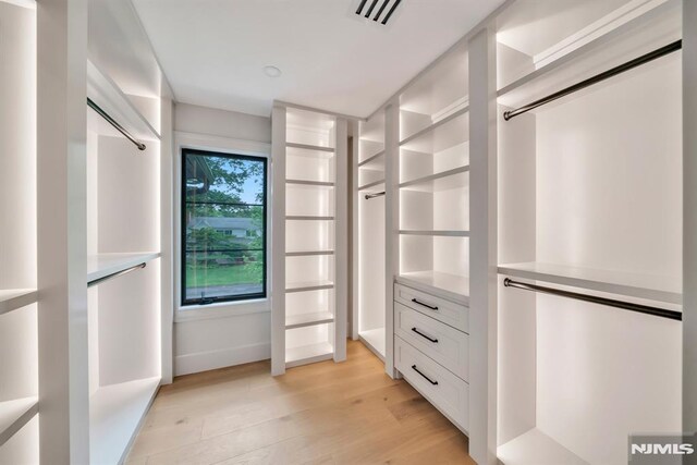 16 Donnybrook Dr, Demarest, NJ 07627 - walk in closet with light wood finished floors