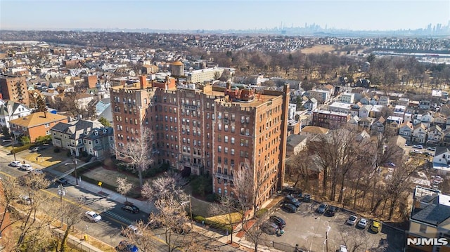 birds eye view of property featuring a city view