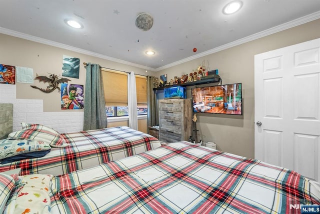 bedroom featuring recessed lighting and crown molding