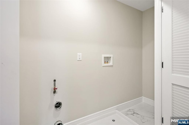 clothes washing area with baseboards, gas dryer hookup, laundry area, hookup for a washing machine, and marble finish floor