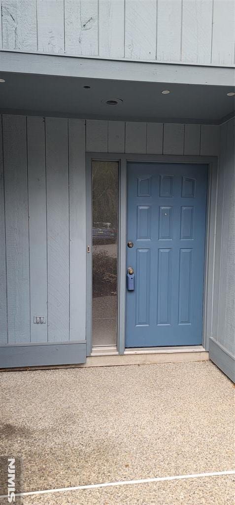 entrance to property with board and batten siding