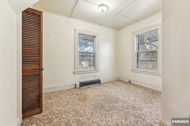 unfurnished room with a wealth of natural light and carpet floors