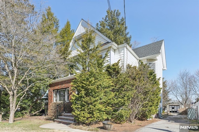 view of front of home with brick siding