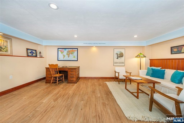 living room with recessed lighting, wood finished floors, and baseboards