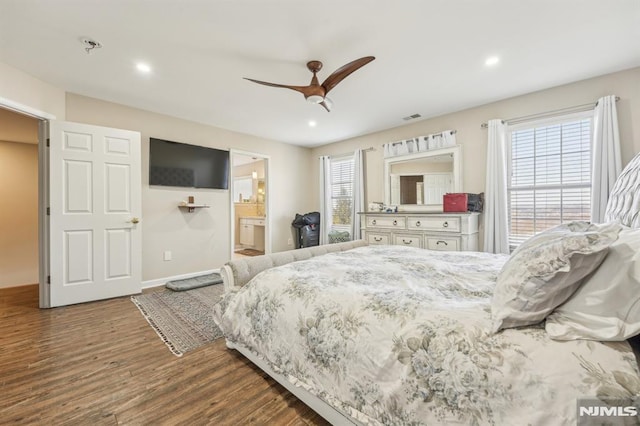 bedroom with recessed lighting, visible vents, multiple windows, and wood finished floors