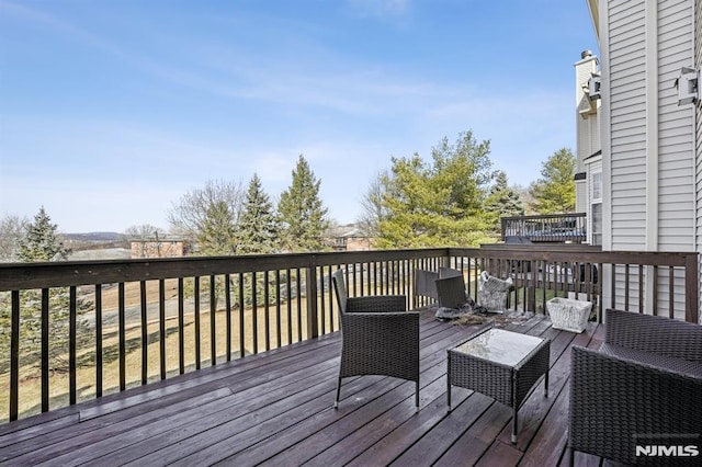 deck with outdoor lounge area