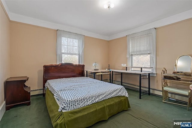 carpeted bedroom with multiple windows and a baseboard radiator