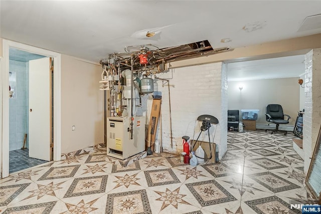 below grade area with tile patterned floors and a heating unit